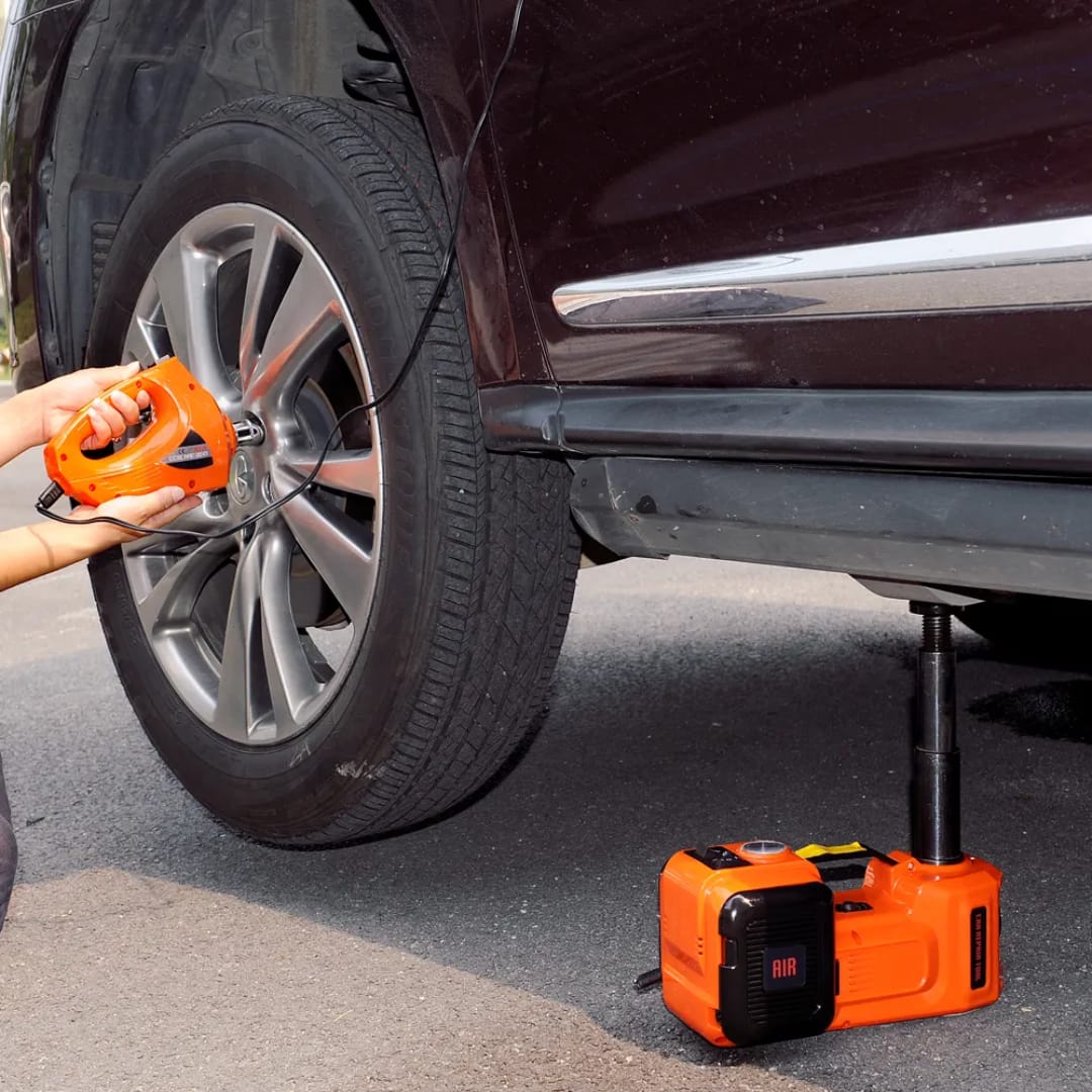 Integrated LED emergency light on the car jack for safe night roadside repairs